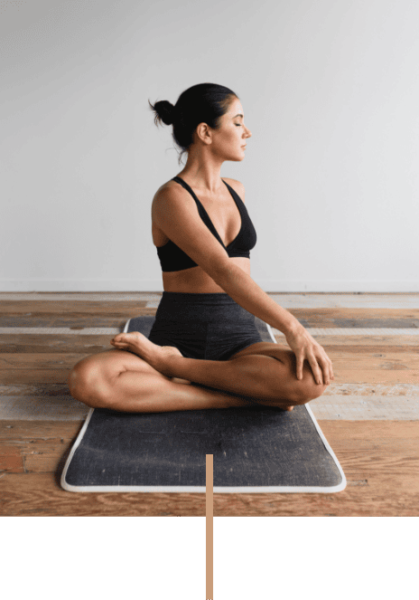 Women doing a yoga stretch at The Functional Movement Club Brookvale